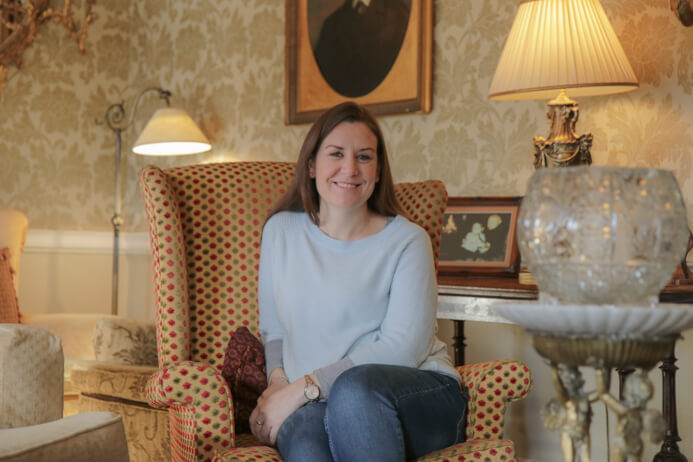 Longueville House Cork review - this is a stunning four-star heritage-listed Georgian property in Mallow Co. Cork in Ireland. This is Melanie May relaxing in the sumptuous in the lounge.