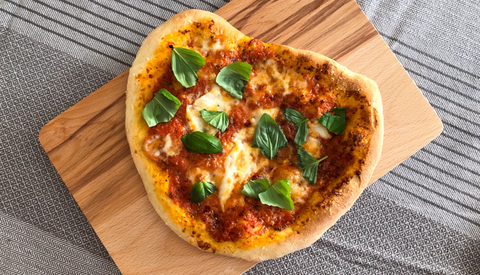 Best Homemade Pizza Recipe with fresh basil.