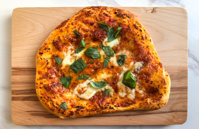 pizza with fresh basil.