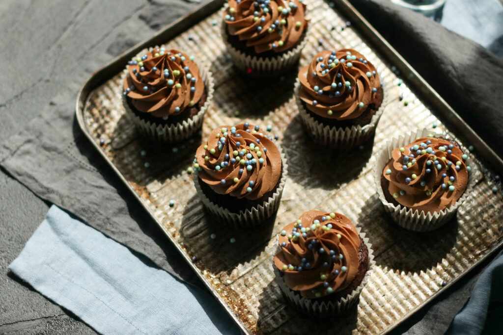 Food photography and styling Chocolate frosted cupcakes