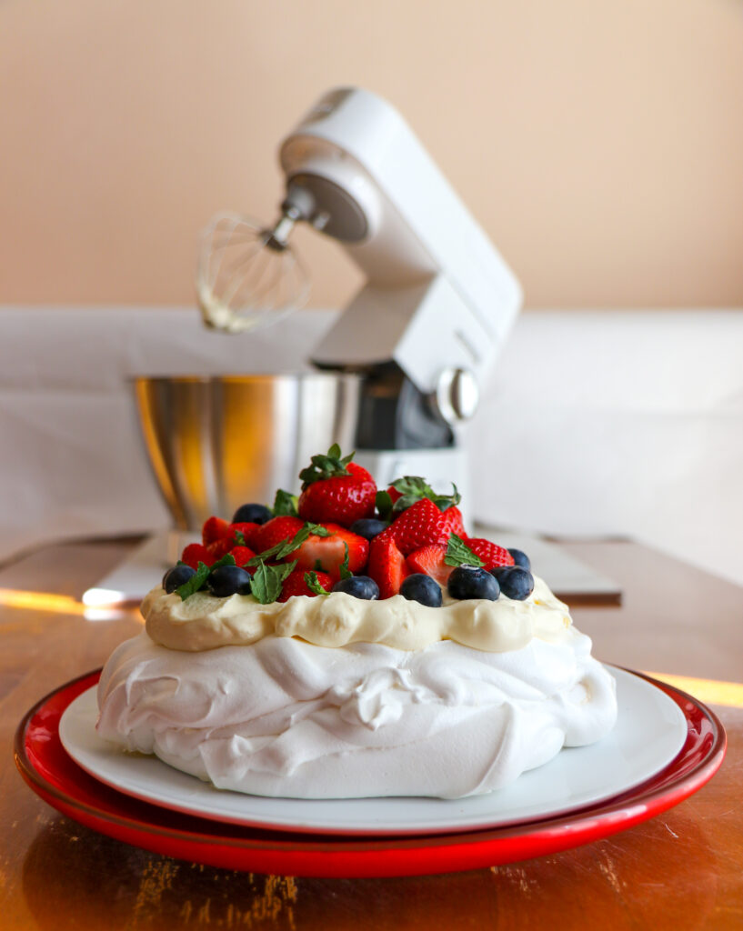 Summer berry pavlova recipe and food photography by Melanie May