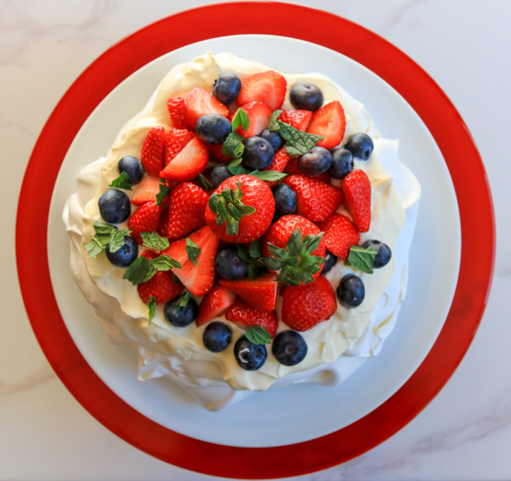 Food photography and styling Summer berry pavlova