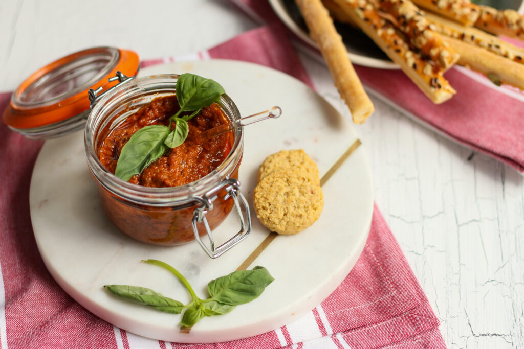 Jar of pesto and crackers - food photography and styling by Melanie May